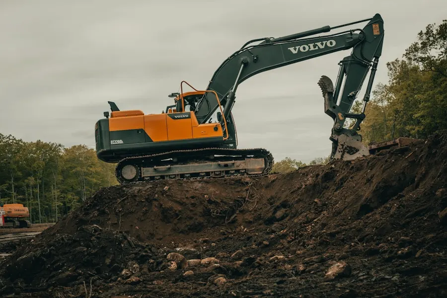 Tracked excavator working a cleared homesite